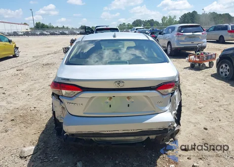 2021 Toyota Corolla Le z USA, uszkodzony, nr VIN JTDEPMAE5MJ141794